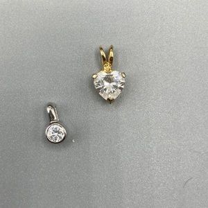 Two cubic zirconia in sterling pendants